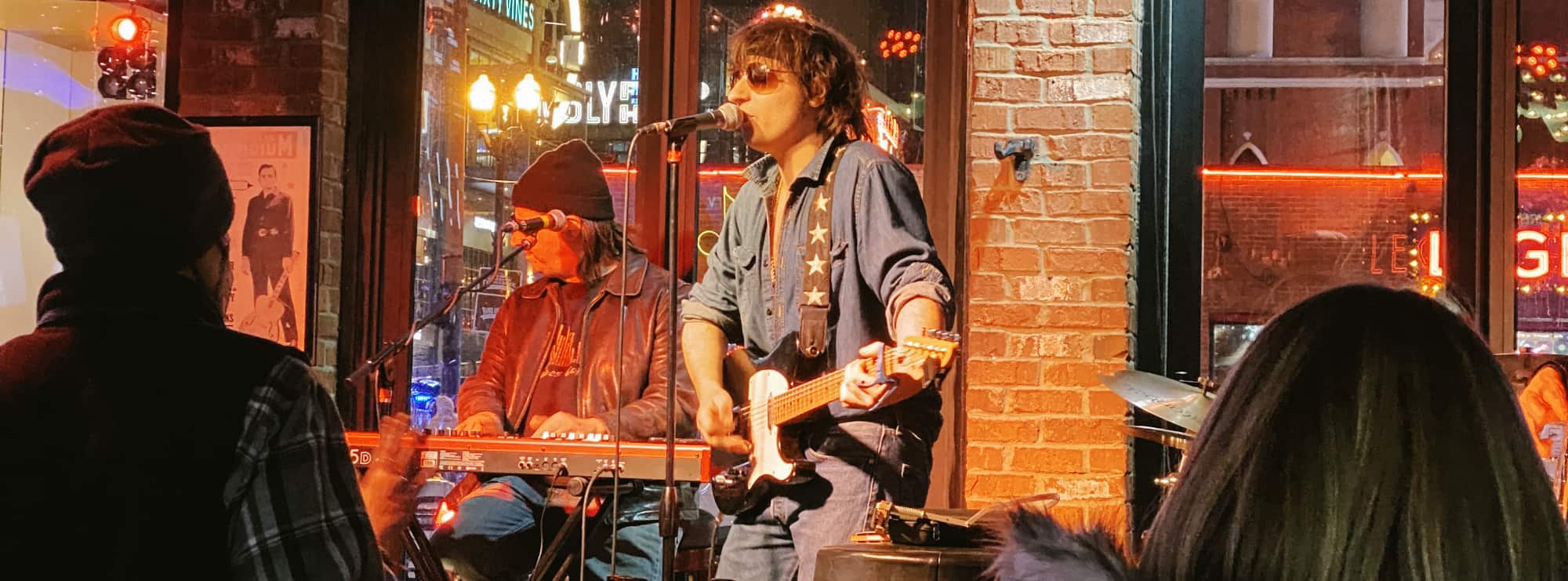 bar singer on guitar in Huntsville